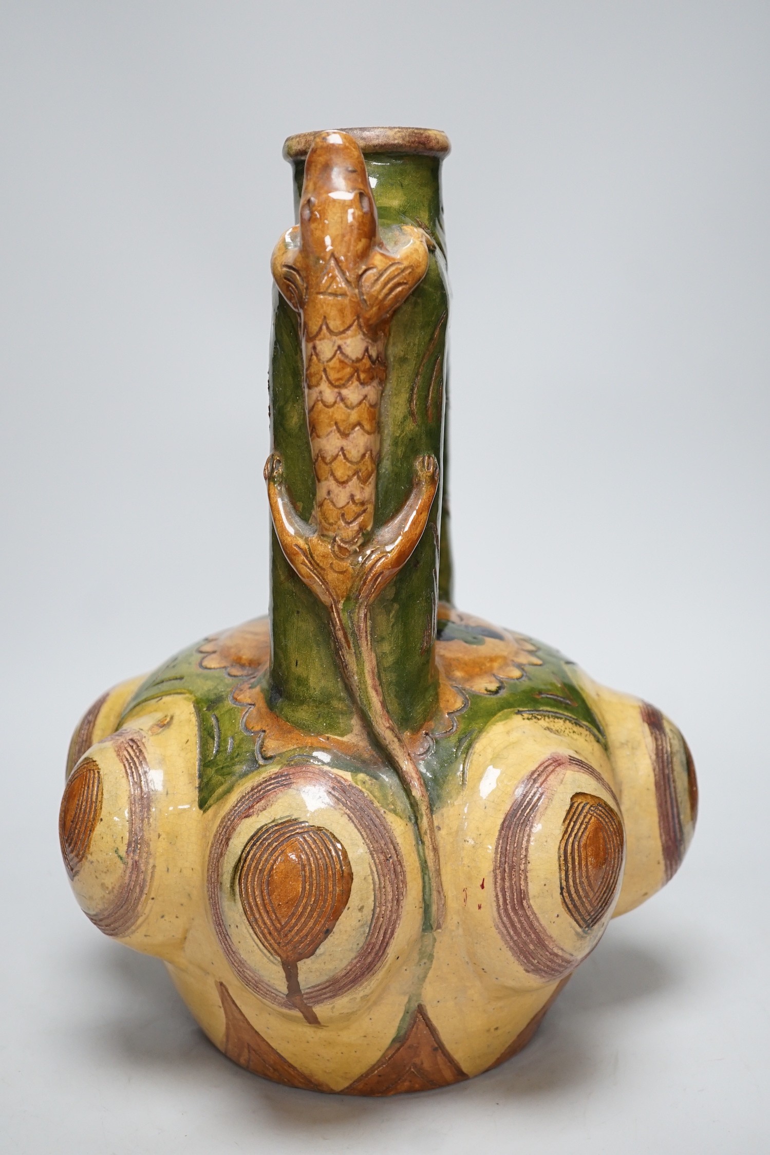 A Continental ‘lizard’ mounted pottery vase, 40cm